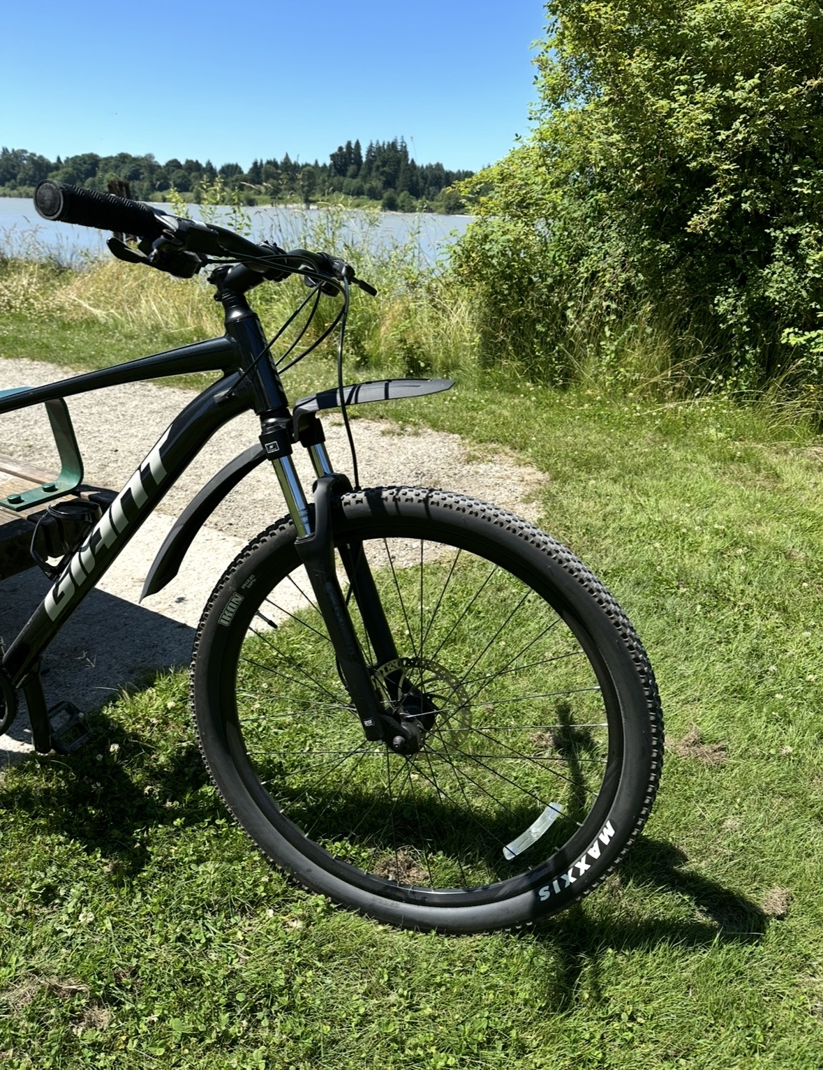 Mountain bike on gravel trail with FenderOne guard installed